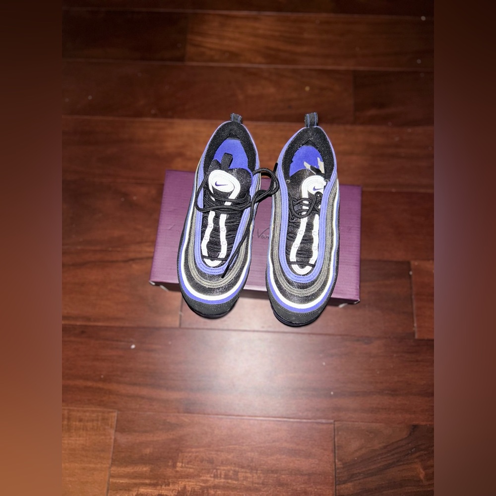 Nike Kids Sneakers in Black, Purple, and White.
